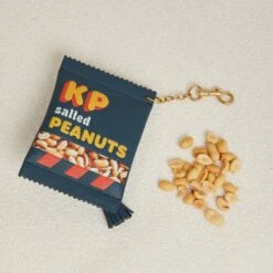 Anya Hindmarch Anya Brands KP Peanuts Coin Purse -Fashion Bag Shop 23 11 28 Model Shoot18191copy